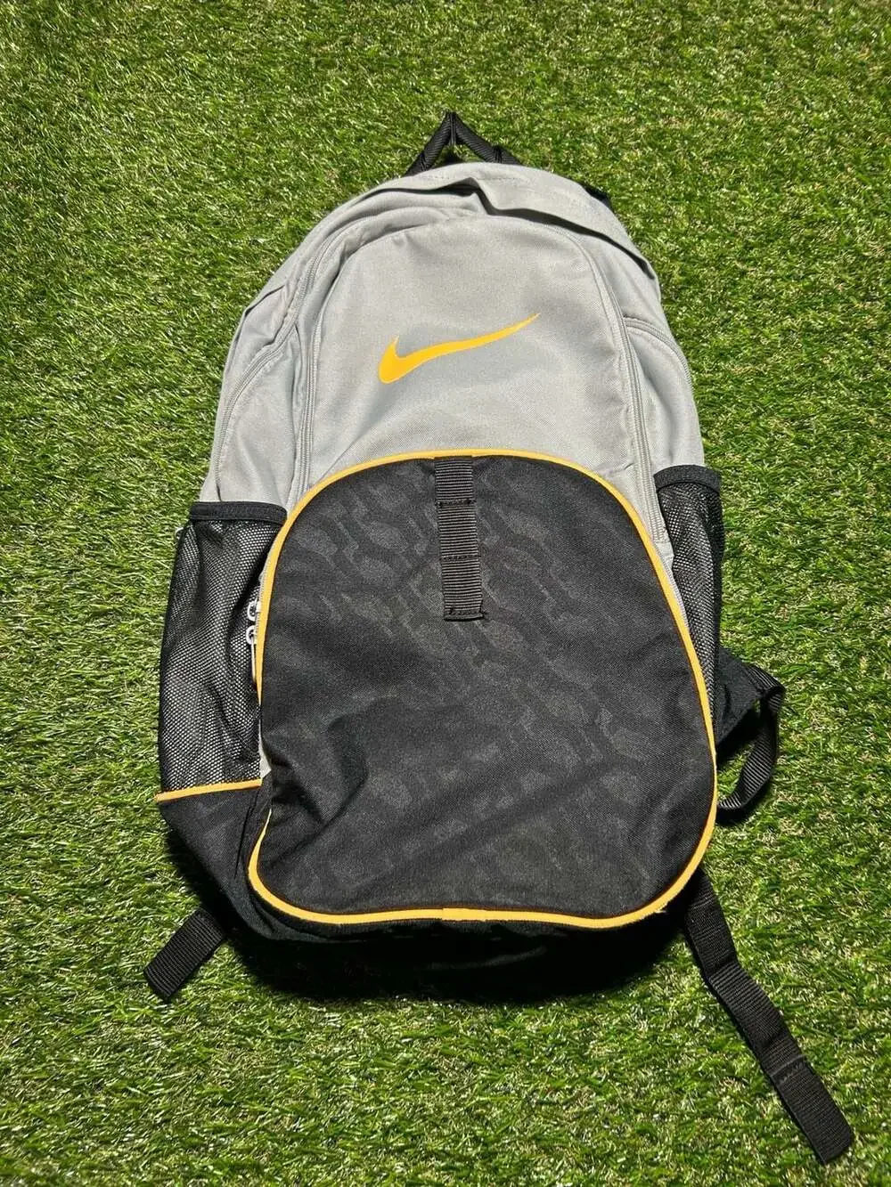Nike Gray and Black Sport Backpack with Orange Accents